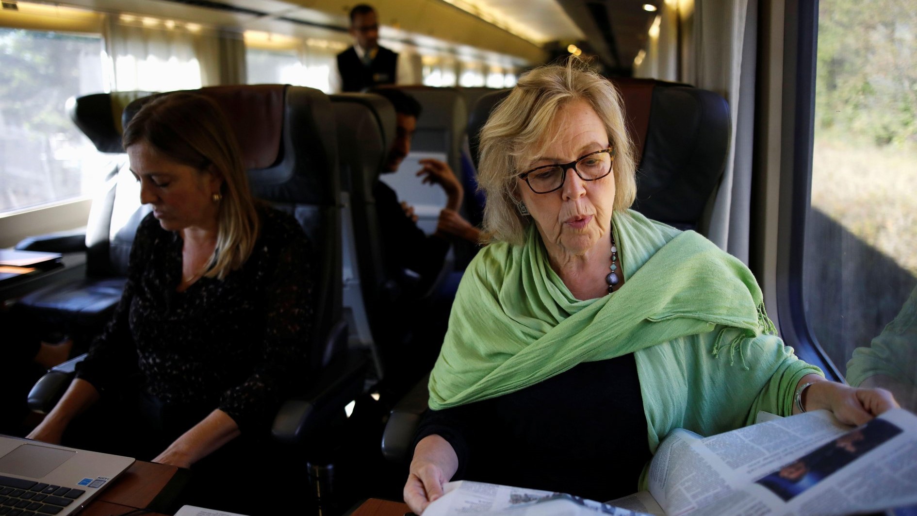 Green Party MP Elizabeth May with chief of staff Debra Eindiguer, travelling by train for an election campaign visit in Montreal.