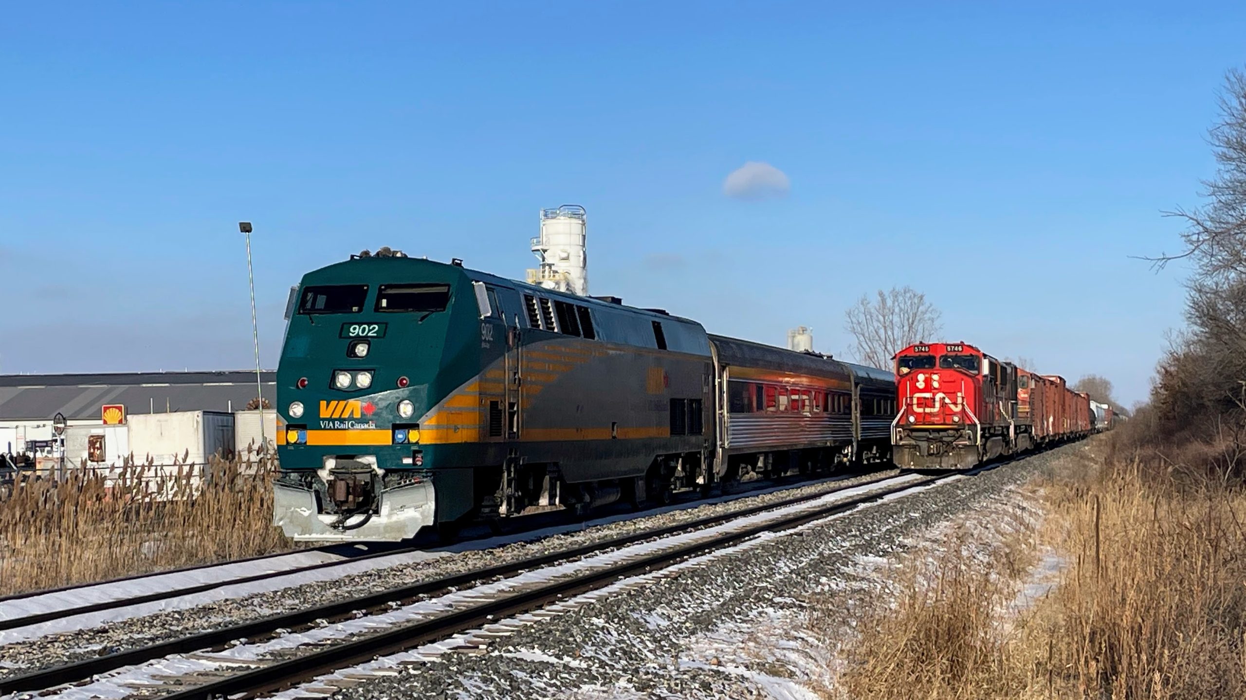 VIA Train 73 to Windsor passes a CN freight train as Sass Road